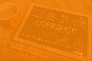 Blackboard with illustrations and symbols for workshop tasks and outcomes